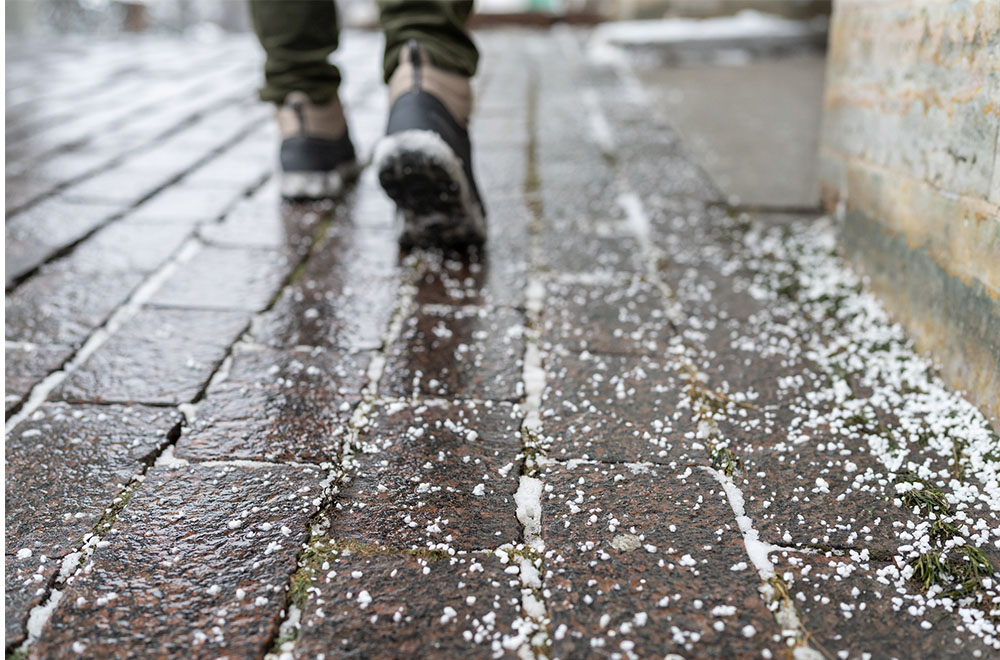 Mower at work on vibrant grass. Copy space web banner.